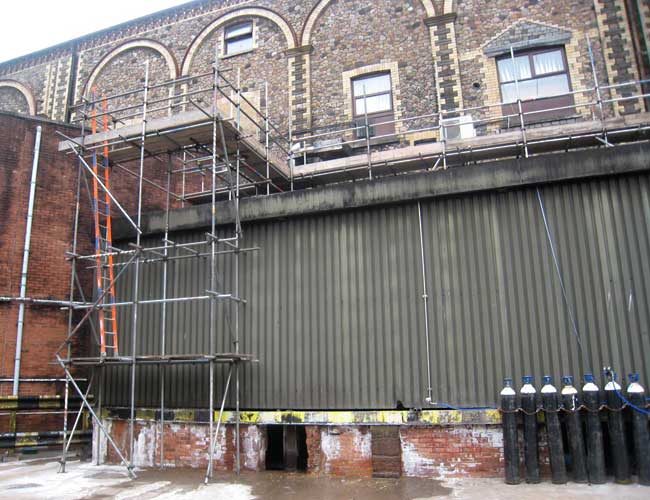 Access tower and walkway for commercial premises.
